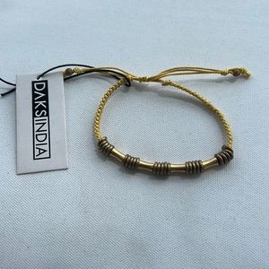 DAKS INDIA brand new gold tone bracelet